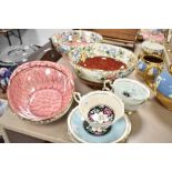 A selection of ceramic bowls by Maling ware and three Paragon tea cups and saucers