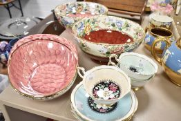 A selection of ceramic bowls by Maling ware and three Paragon tea cups and saucers