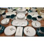 A selection of tea and dinner wares by Denby in the Greenwheat design