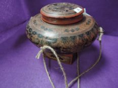 A Japanese lacquer lidded vessel having Indian dancer and animal design