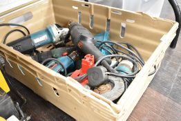 A selection of Makita and similar power tools including angle grinder and drill etc