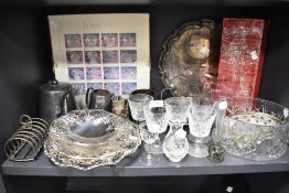 A selection of glass and metal wares including pink art glass vase wine glasses and fruit bowl