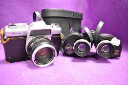 A pair of Greenkat De Luxe 8x40 binoculars and a Kowa film camera both having cases