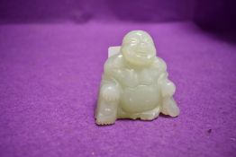 A Chinese Jade or nephrite figure of a seated Buddha 2inch high