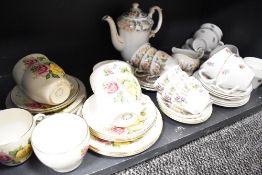 A selection of tea cups and saucers Beswick and Paragon country lane