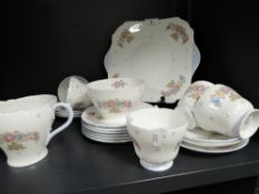 A part tea service by Shelley having a transfer printed design