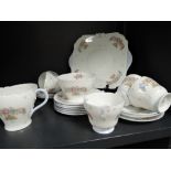 A part tea service by Shelley having a transfer printed design