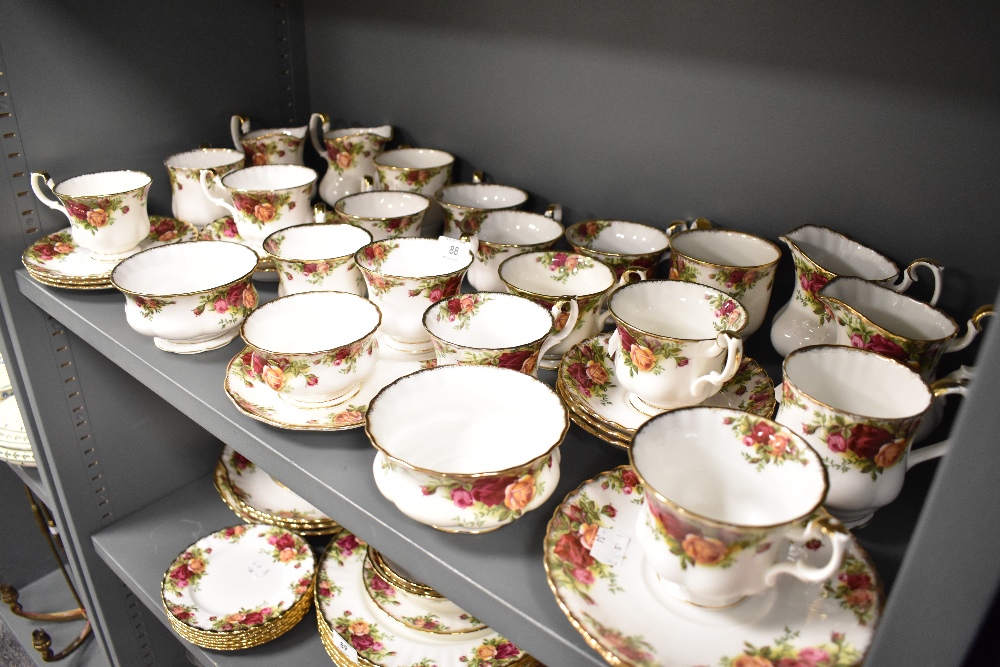 A selection of tea cups and saucers by Royal Albert in the Old Country Roses design