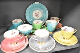 A harlequin tea set of cups and saucer trios by Walbrzych