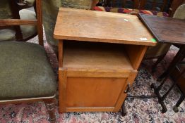 A craftsman made golden oak bedside cabinet