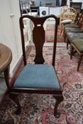 An early 20th Century mahogany high back dining chair in the Queen Anne style