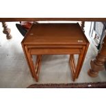 A vintage teak G plan nest of three tables