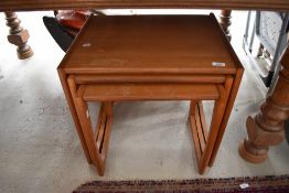 A vintage teak G plan nest of three tables