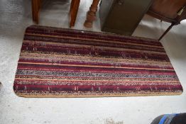 A vintage carpet piece, made into rug size, rounded edges, approx. 192 x 92cm