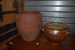 An Earthenware egg crock and a similar glazed pot