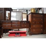 A Stag dressing table and tall drawer chest