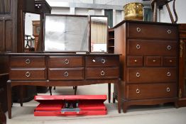 A Stag dressing table and tall drawer chest