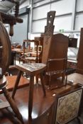 A traditional stained frame spinning chair, in the Celtic style