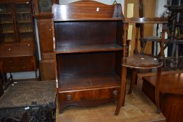 A reproduction mahogany low shelf and whatnot