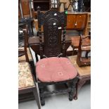 A period oak carved hall chair