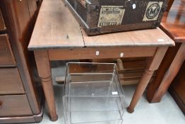 A 19th Century pine kitchen table, having turned legs, approx. 114 x 79cm