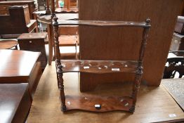 A small Victorian style mahogany waterfall style open wall shelf , width approx. 44cm