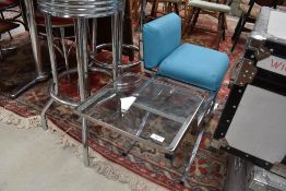 A vintage chrome and glass telephone seat, aquamarine vinyl seat