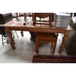 A Victorian oak dining table or desk having leather inset top, turned legs, approx. Dimensions 166 x