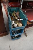 A set of stacking parts trays containing door furniture etc