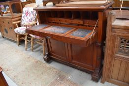 An impressive early Victorian mahogany secretaire desk having well fitted interior and double