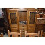 An Old Charm recessed sideboard/display cabinet, in golden oak