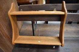 A small Ercol style wall shelf