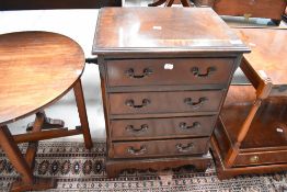 A reproduction Regency dwarf chest of four drawers, height approx. 52cm