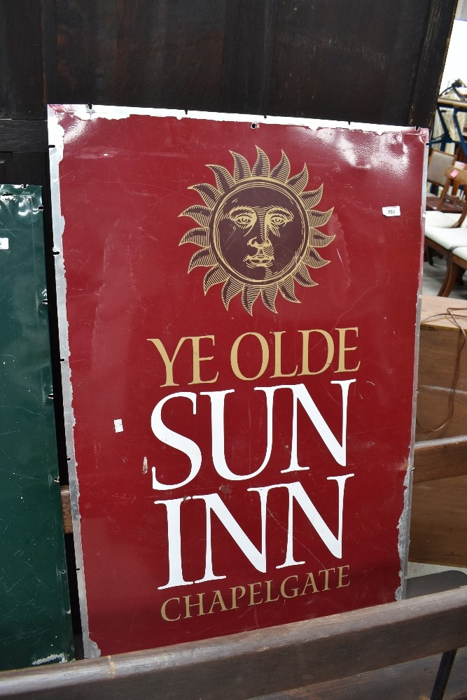 A large metal pub sign, Ye Olde Sun Inn