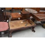 A reproduction Regency octagonal top occasional table on quadruple splay legs with paw feet