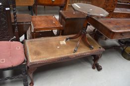 A reproduction Regency octagonal top occasional table on quadruple splay legs with paw feet