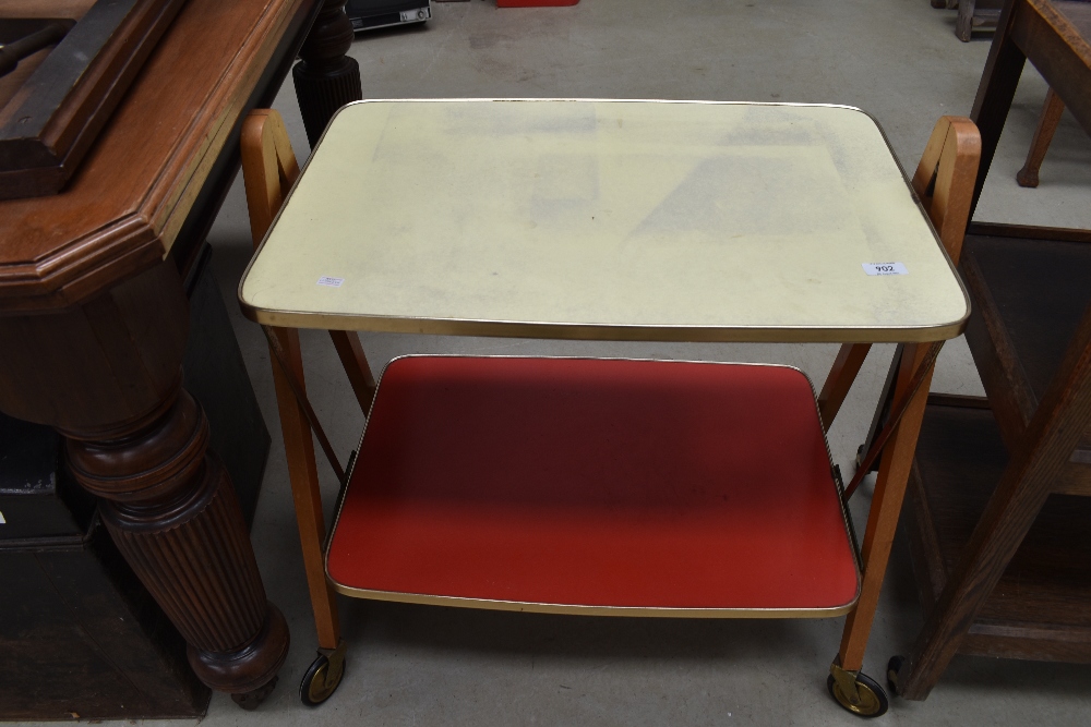 A vintage formica topped tea trolley