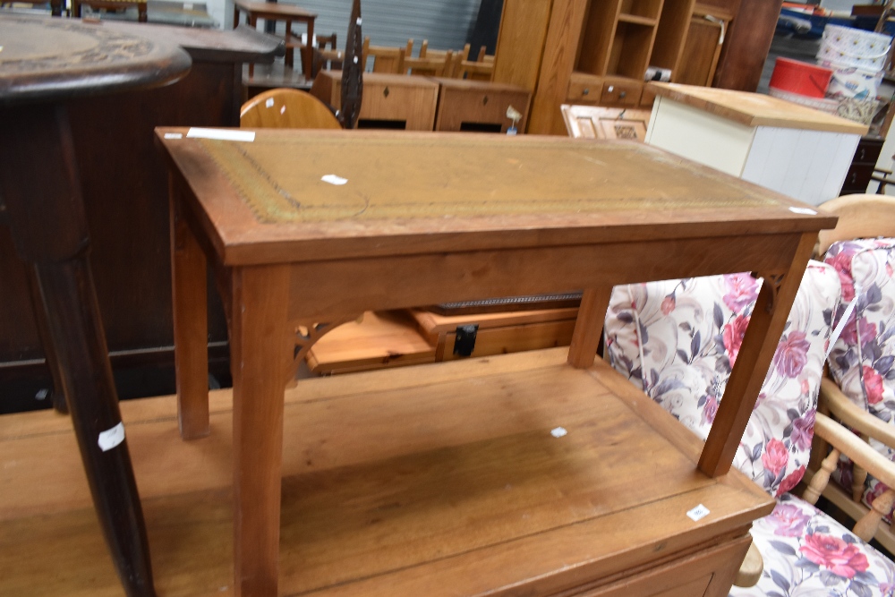 A vintage coffee table having inset top and teak frame