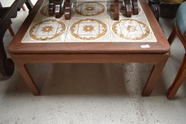 A vintage teak tile top square coffee table