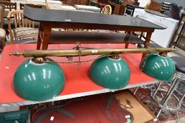 A vintage pool table light fitting