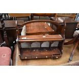 A 19th Century mahogany wall shelf with stationery compartments, width approx. 42cm