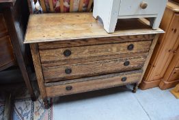 An early 20th Century oak low bedroom chest