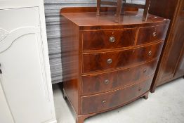 A nice quality Edwardian Regency revival mahogany and satinwood detailed bow fronted chest of two