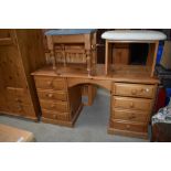 A modern pine dressing table and stool