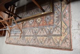 A Persian style rug, approx 180 x 120cm