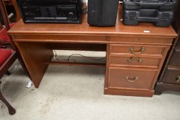 A reproduction mahogany desk or dressing table