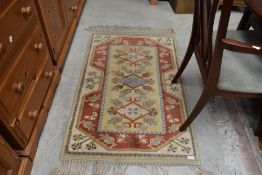 A Turkish style rug, believed to be Kalkan, approx. 130 x 80cm