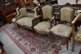 A late 19th Continental style salon suite, in need of some restoration , good reupholstery project