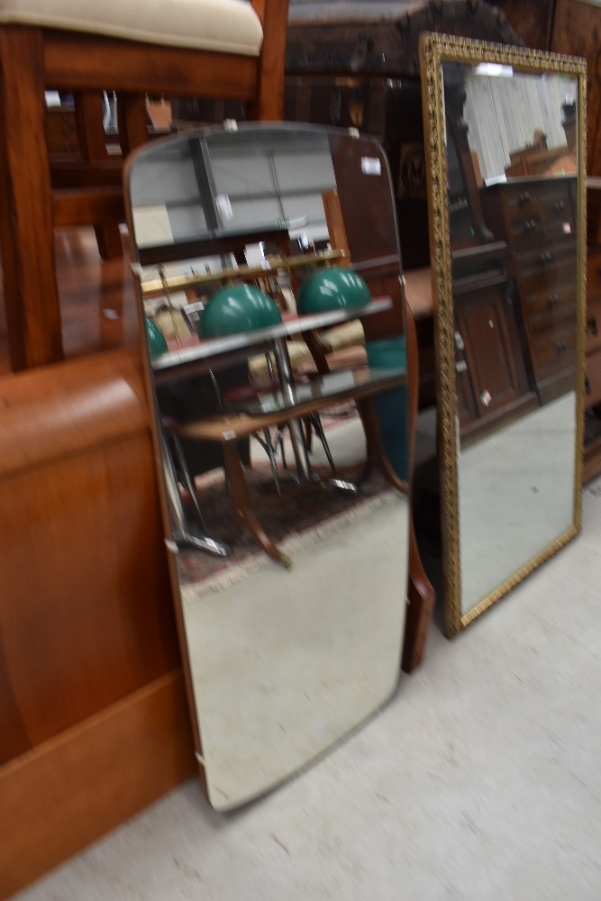 A vintage frameless dressing table mirror