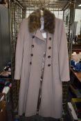 A ladies wool/cashmere blend beige coat, new with tags, longer length, size 12.